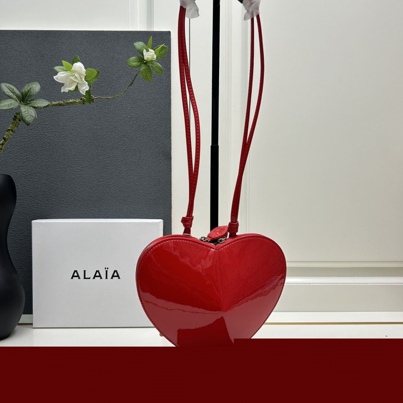 Alaia Round Bags